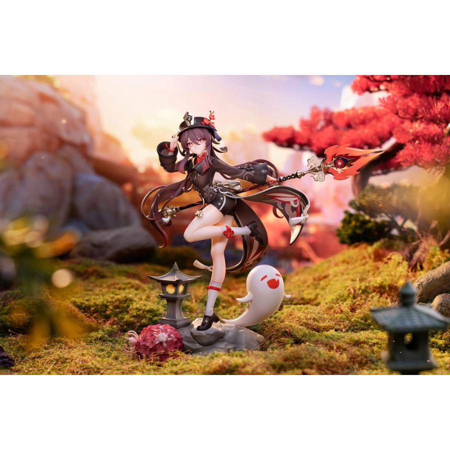 A Hu Tao figure posed on a mossy scenic base with lanterns and a ghost accessory.